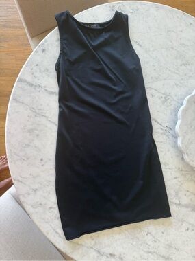 Indah Black Sleeveless Midi Sheath Dress